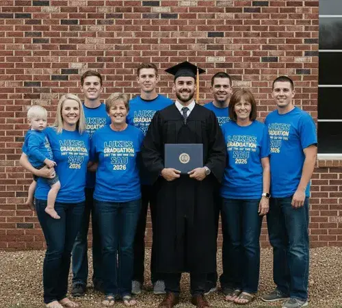Family wearing matching t-shirts from SameDayCustom to celebrate their son's graduation Family wearing matching t-shirts from SameDayCustom to celebrate their son's graduation